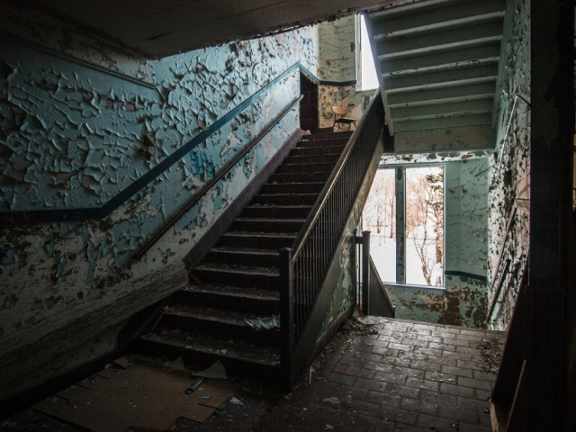 stairwell inside of abandoned shcool
