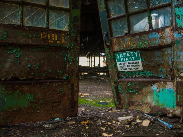 abandoned industrial rayon factory broken rusty door