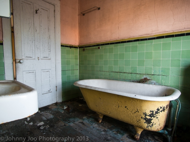 claw foot bathtub in abandoned farm house