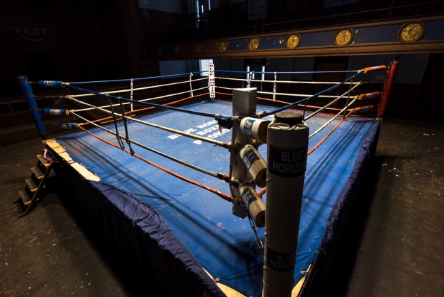 abandoned blue horizon boxing ring with light on