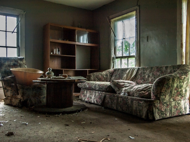 destroyed living room in abandoned countryside house