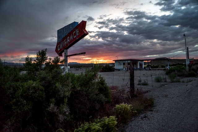 Woodside Utah duel entrance sign at sunset