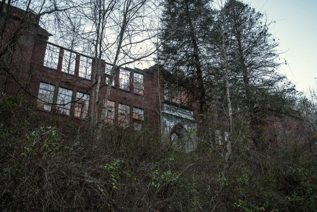 abandoned school on top of a hill